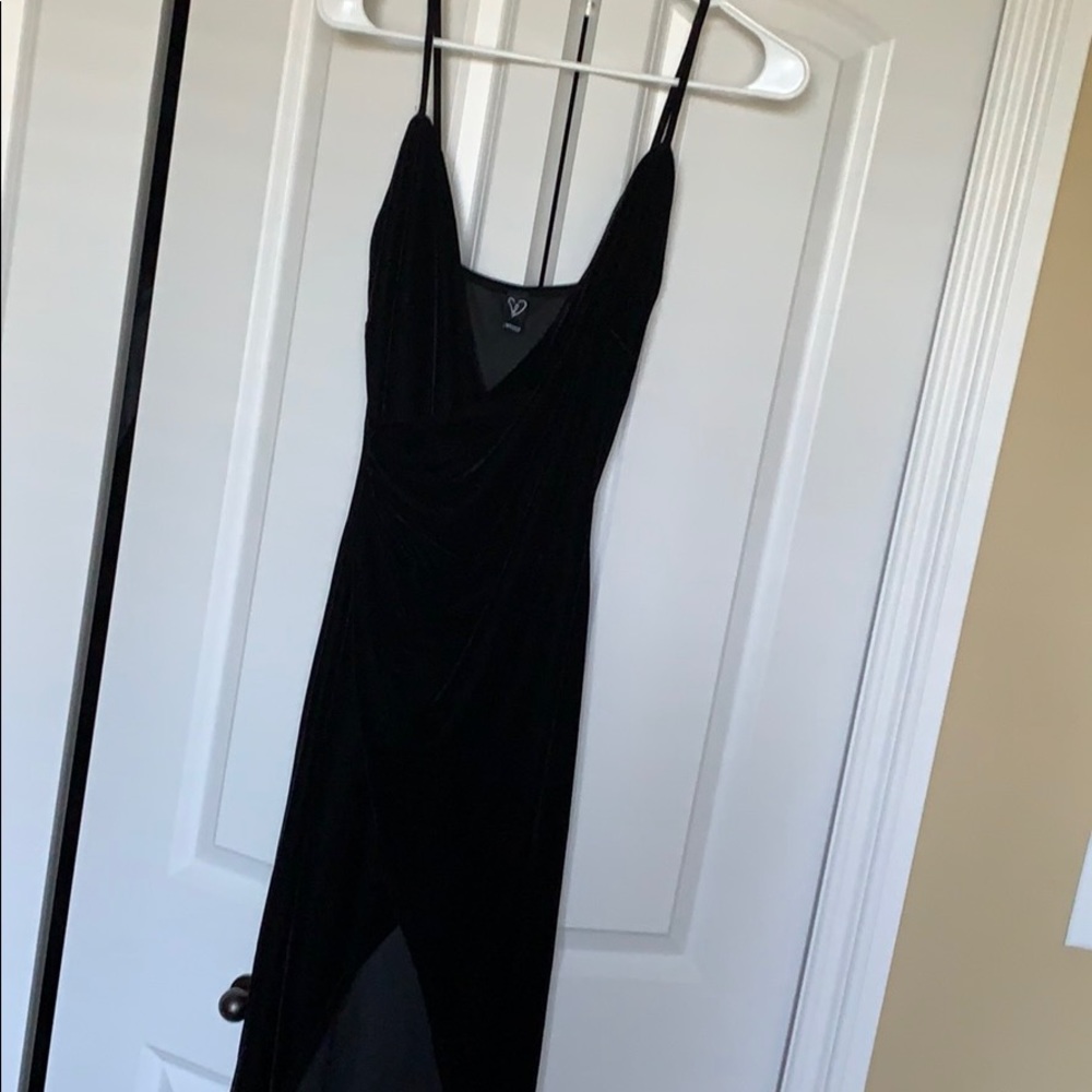 Long black velvet dress, slit up the front